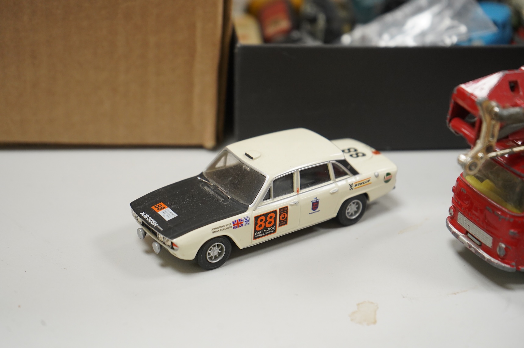 Twenty 1960s Corgi Toys, all playworn or restored examples in reproduction boxes, including cars, a milk float and two Land Rovers, etc., together with a quantity of additional diecast, etc. Vehicles by a variety of make